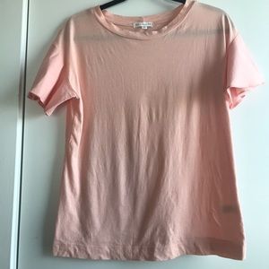 Light pink shirt with detailed ruffle sleeve